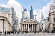 Street in London with Royal Exchange, Bank of England, and new, modern skyscrapers